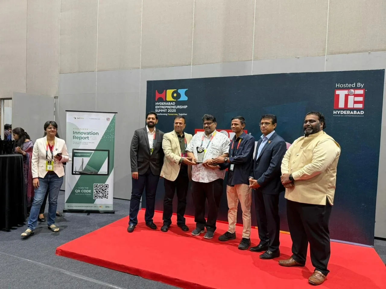 The DeepGrid Semi team receiving the TiE50 award on stage at the Hyderabad Entrepreneurship Summit
